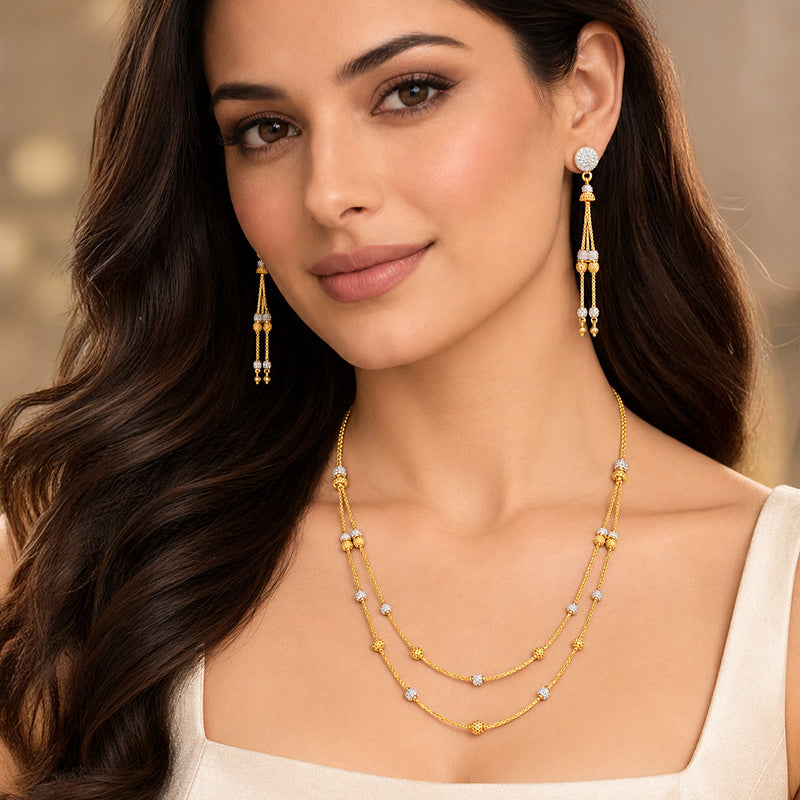Beautiful 22 karat gold two layered necklace and earrings set for women