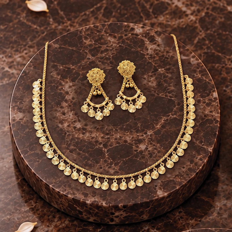 Elegant 22k yellow gold necklace and earring set with delicate running tassels