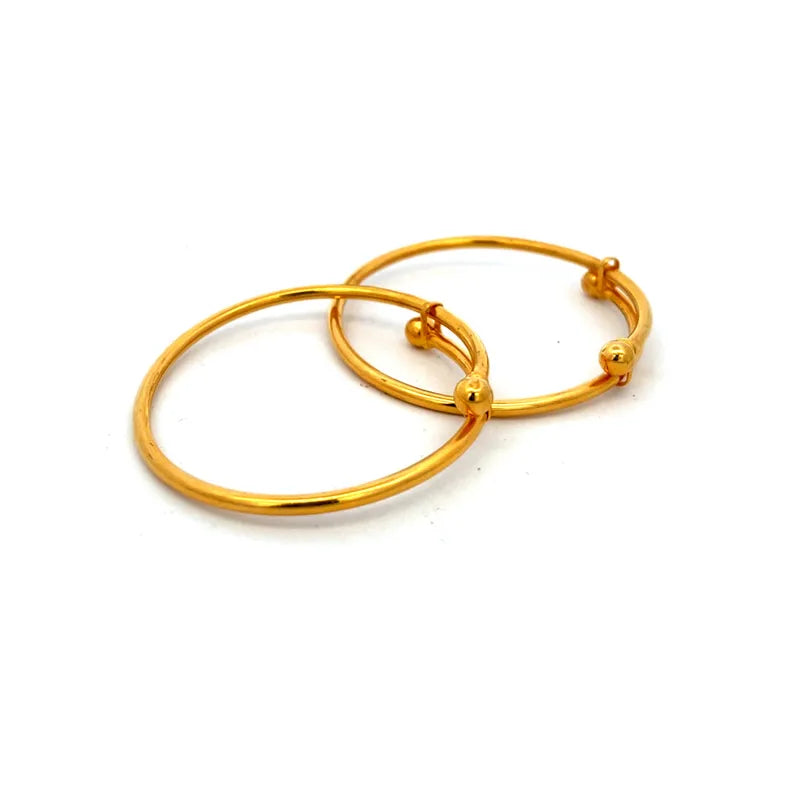 Set of two adjustable 22K yellow gold baby bangles for everyday wear