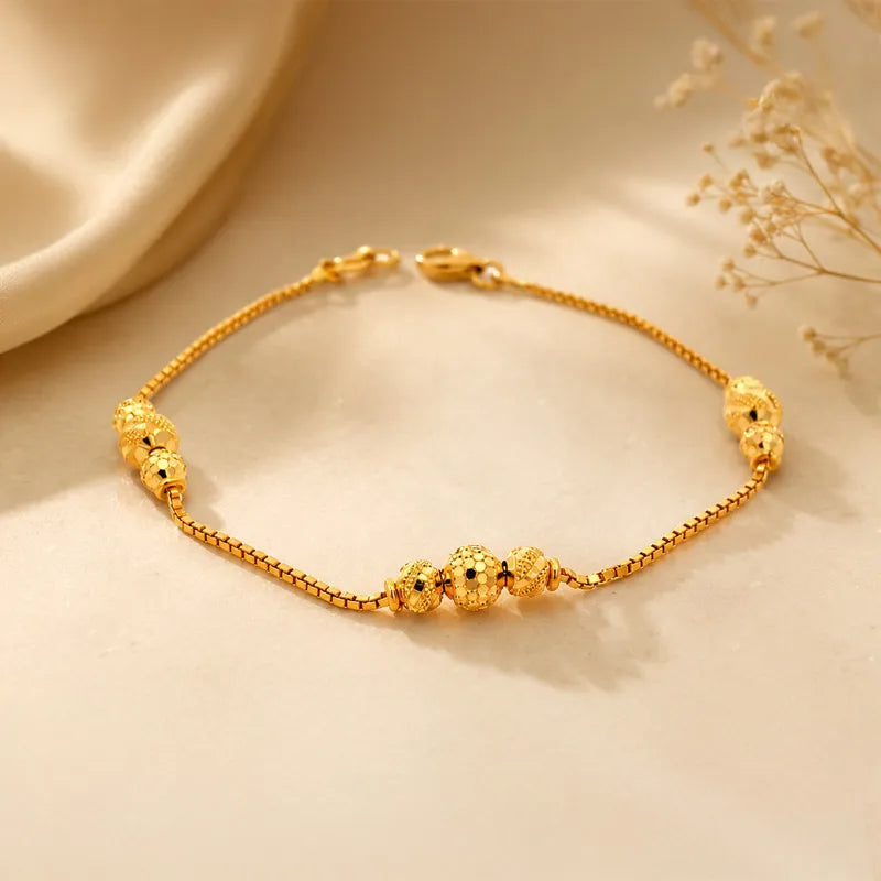 22K Two-Toned Gold and Black Beaded Circle Pendant Bracelet