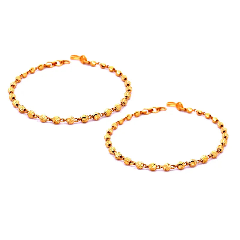 Set of two elegant 22K yellow gold baby bracelets, 5.6 inch length, suitable for unisex wear.