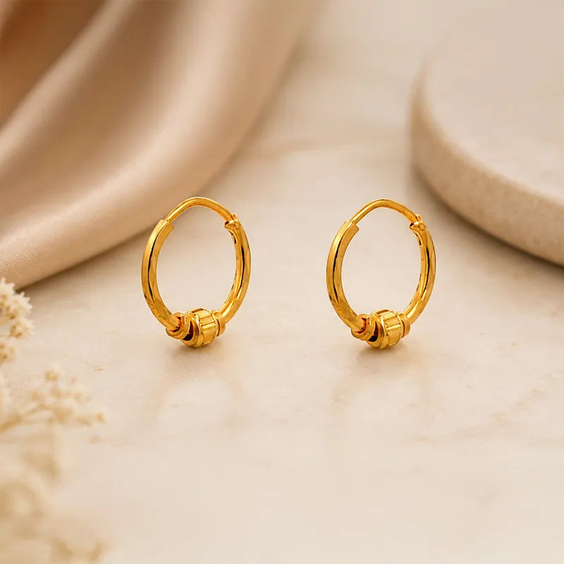 Classic 22K yellow gold hoop earrings perfect for everyday elegance and comfort