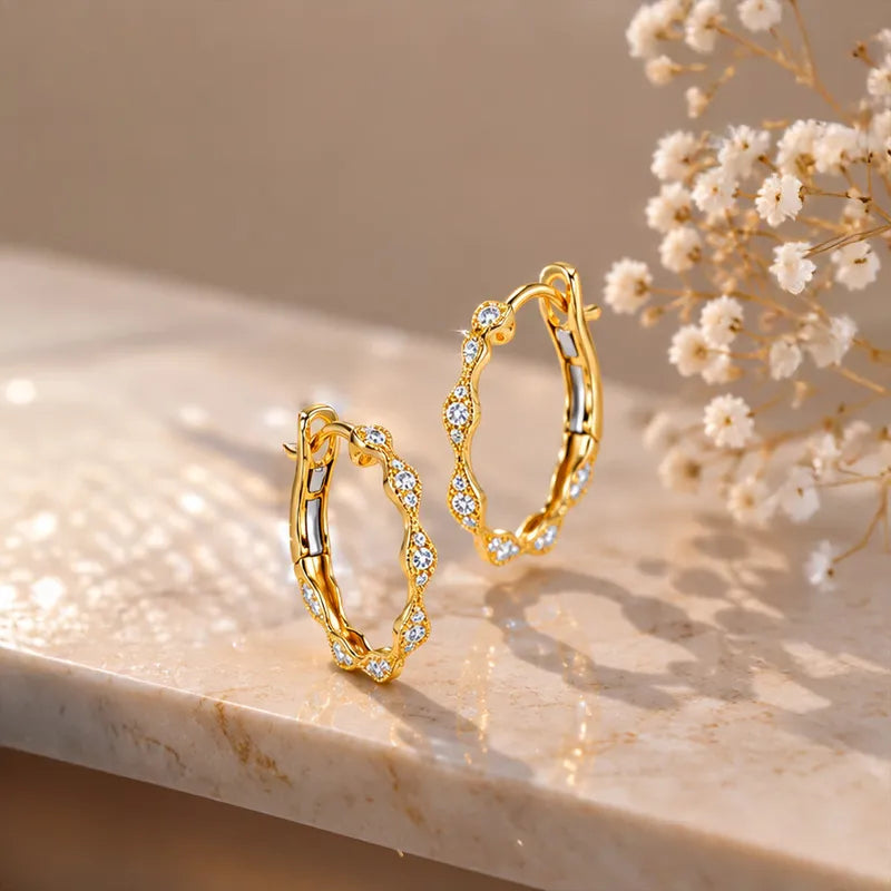 18K Yellow Gold Diamond Swirl Huggies Earrings