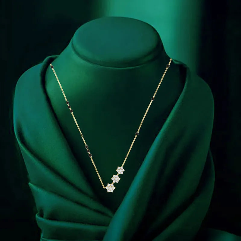 Floral Diamond Mangal Sutra in 18K yellow gold.