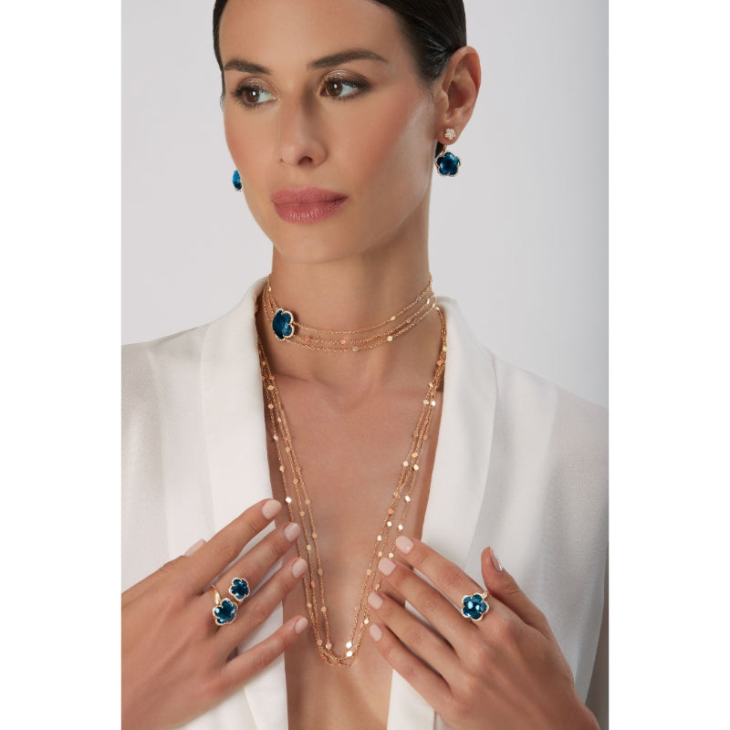 Bon Ton Contrari&eacute; Ring in 18K Rose Gold with London Blue Topaz and White Diamonds.