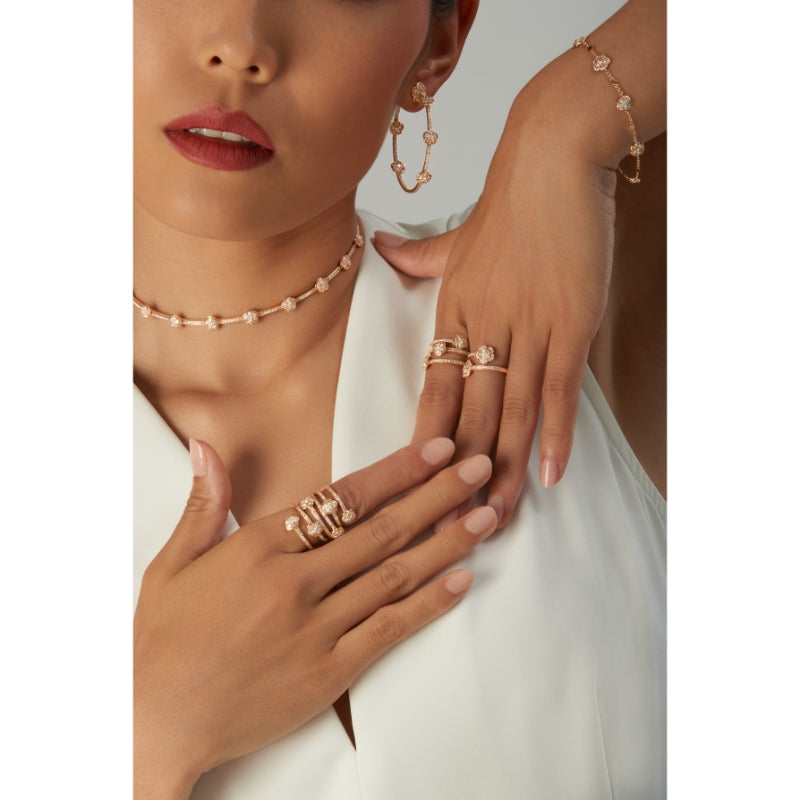 Figlia dei Fiori Two Flowers Contrari&eacute; Ring in 18K Rose Gold with White and Champagne Diamonds.