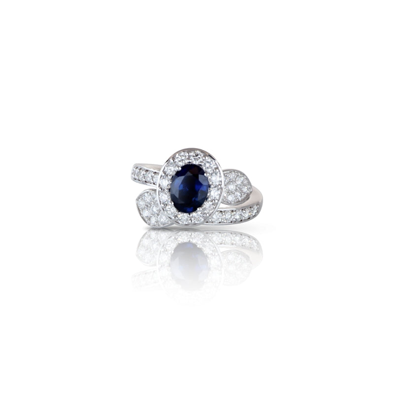 Heart to Earth Ring in 18K White Gold with Oval Blue Sapphire 6x8mm and White Diamonds.