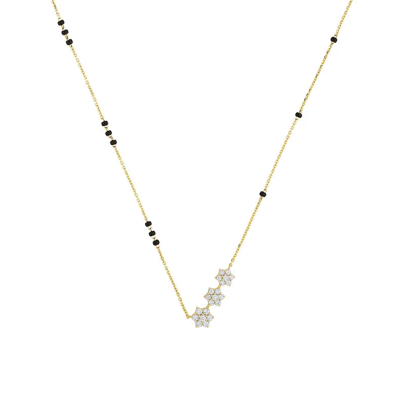 Floral Diamond Mangal Sutra in 18K yellow gold.