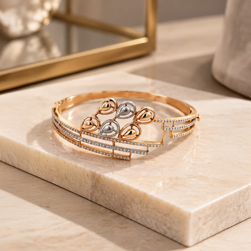 18K Rose Gold Bangle with Geometric Teardrop Design