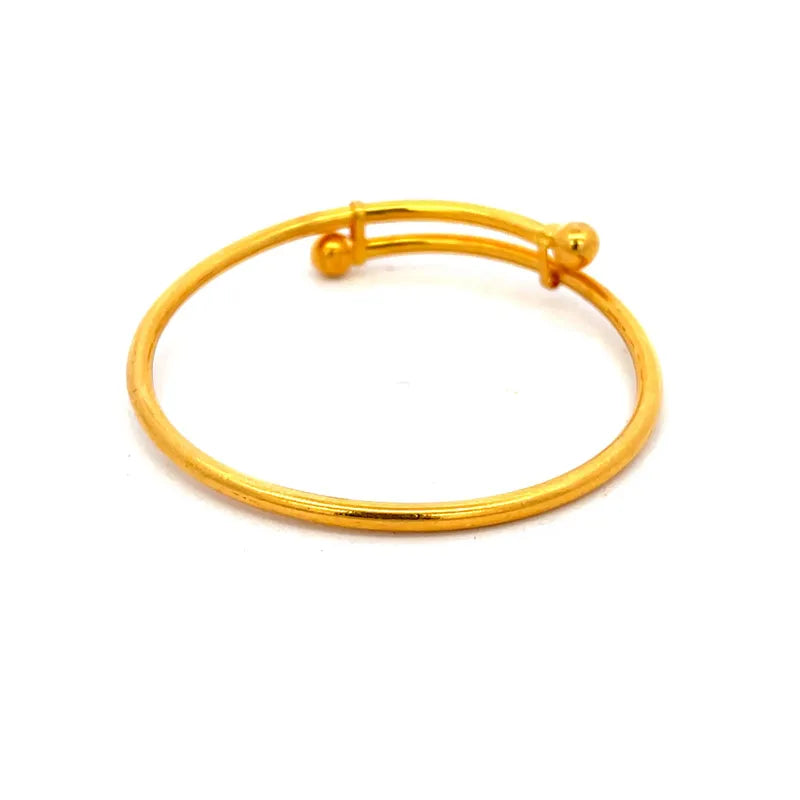Set of two adjustable 22K yellow gold baby bangles for everyday wear