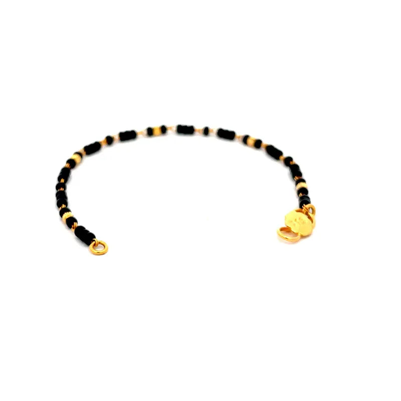 Elegant 22K Yellow Gold Baby Bracelet with Black Beads for Little Ones