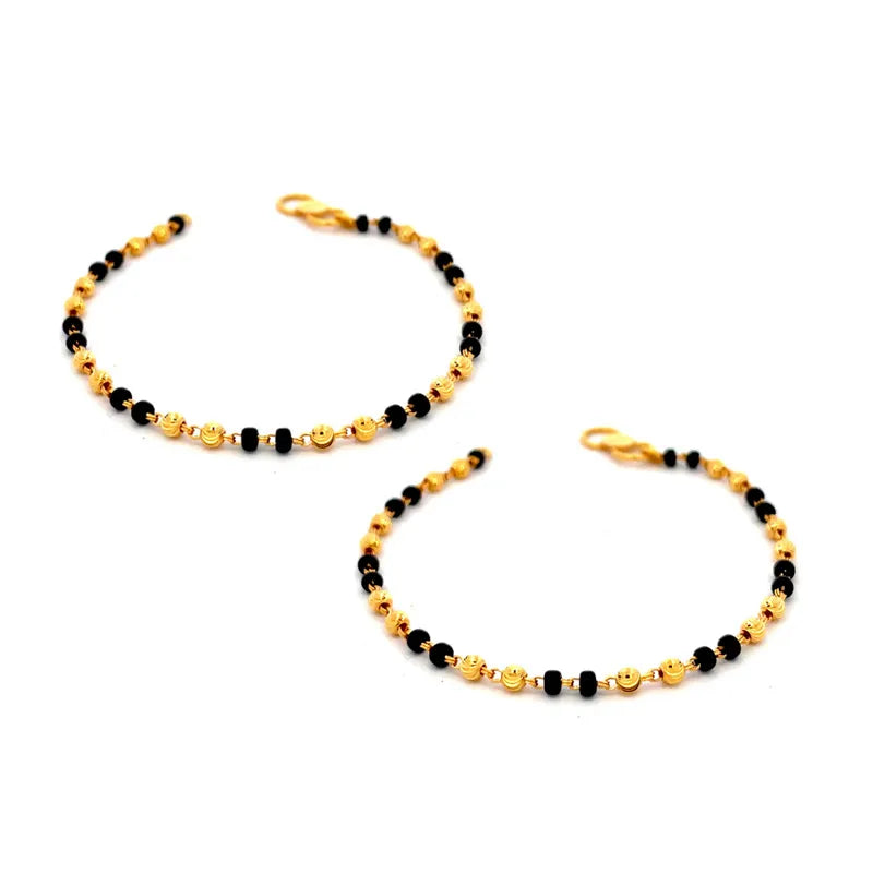 Elegant 22K Yellow Gold Baby Bracelet with Black Beads for Little Ones