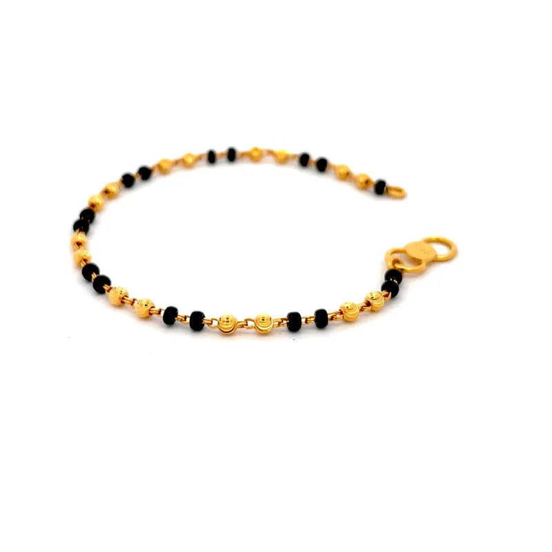 Elegant 22K Yellow Gold Baby Bracelet with Black Beads for Little Ones