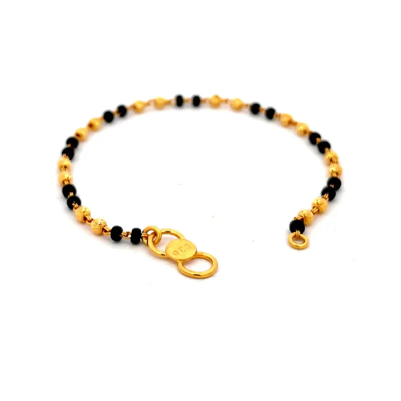 Elegant 22K Yellow Gold Baby Bracelet with Black Beads for Little Ones