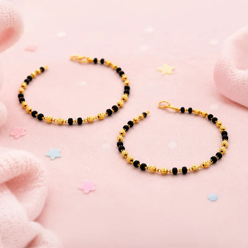 Elegant 22K Yellow Gold Baby Bracelet with Black Beads for Little Ones