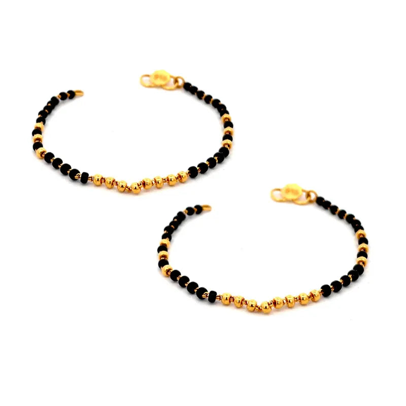 Elegant 22K Yellow Gold Baby Bracelet with Black Beads for Cherished Moments
