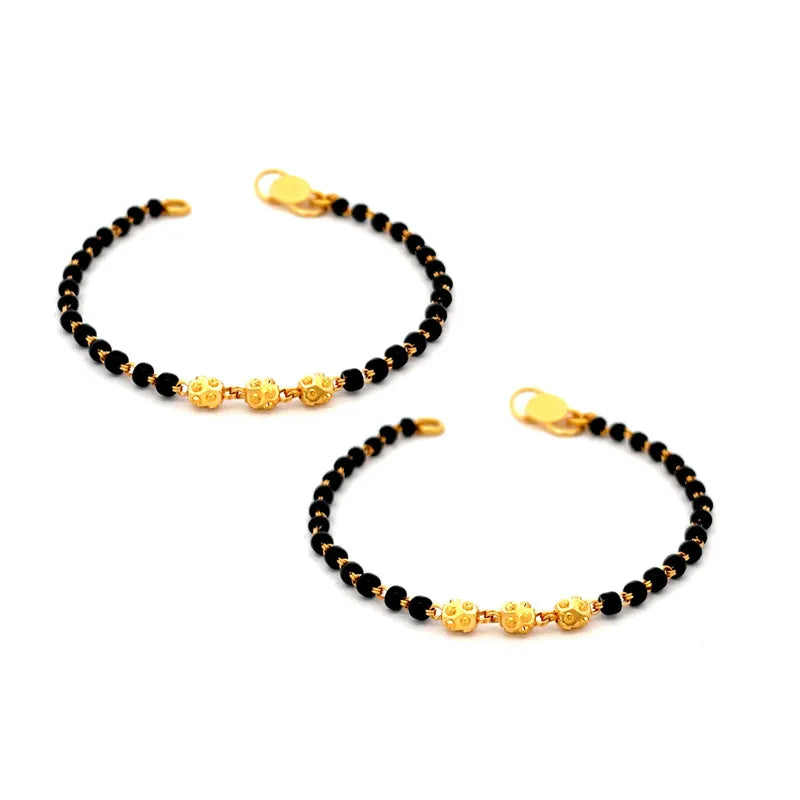 Elegant 22K Yellow Gold Baby Bracelet with Black Beads for Little Ones