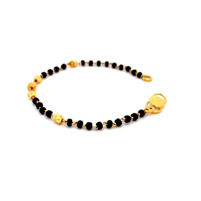 Delicate 22K Yellow Gold Baby Bracelet with Black Beads for a Sweet Keepsake