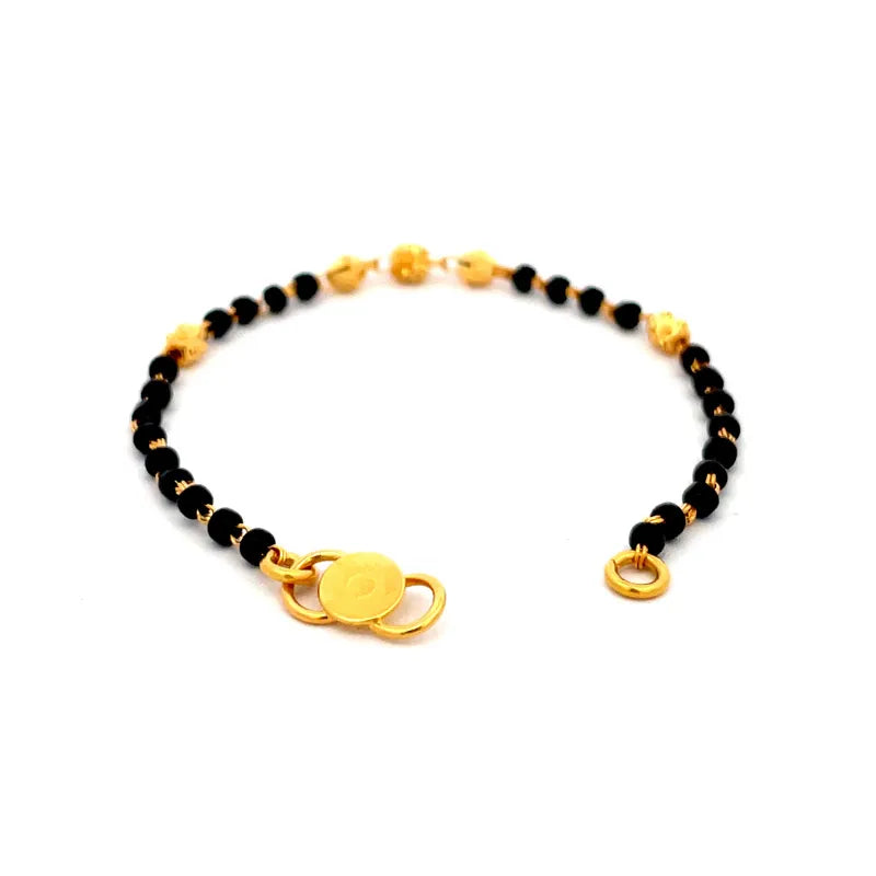 Delicate 22K Yellow Gold Baby Bracelet with Black Beads for a Sweet Keepsake