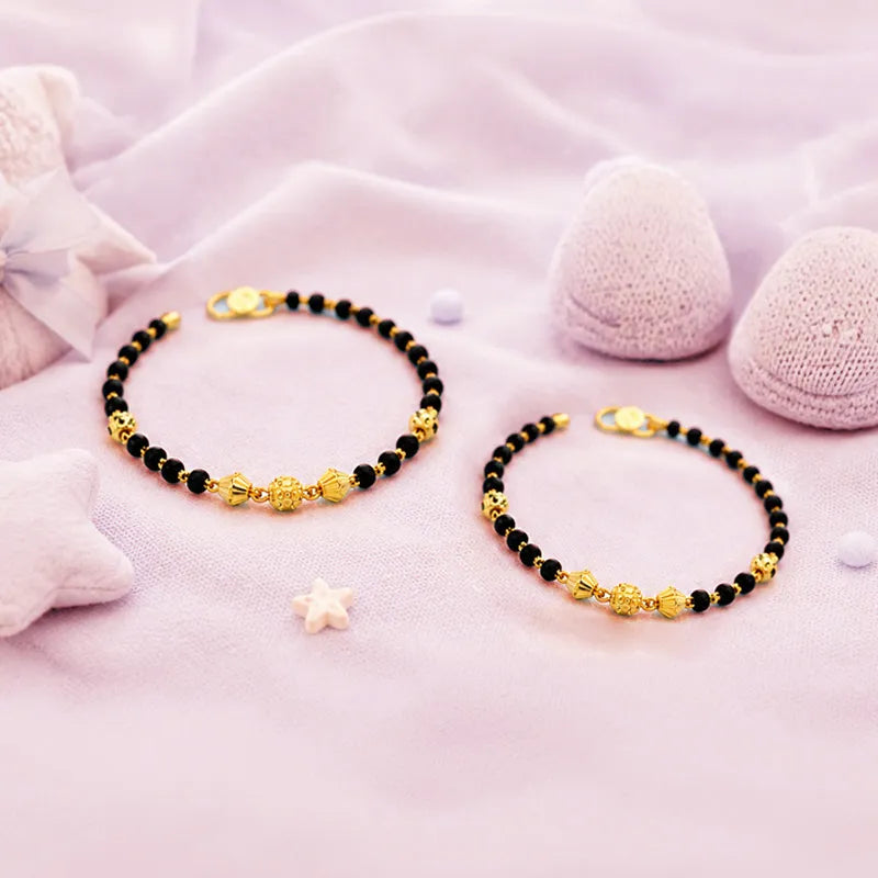 Delicate 22K Yellow Gold Baby Bracelet with Black Beads for a Sweet Keepsake