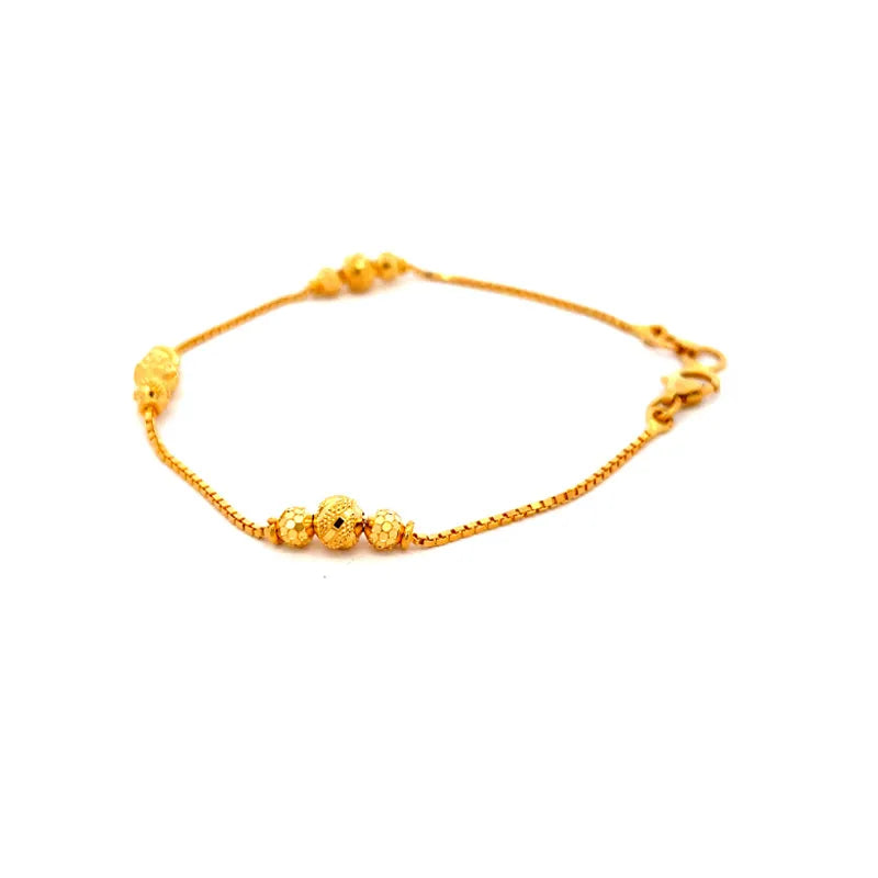22K Two-Toned Gold and Black Beaded Circle Pendant Bracelet
