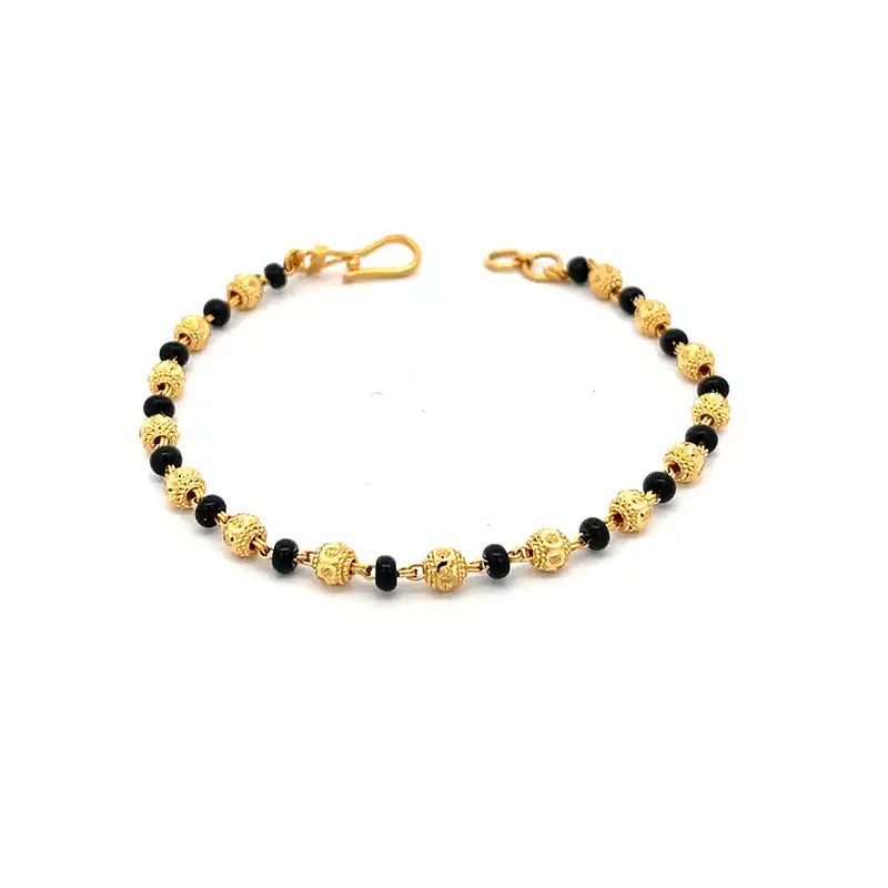Elegant 7.5 Inch Black Bead and 22K Yellow Gold Bracelet for Women