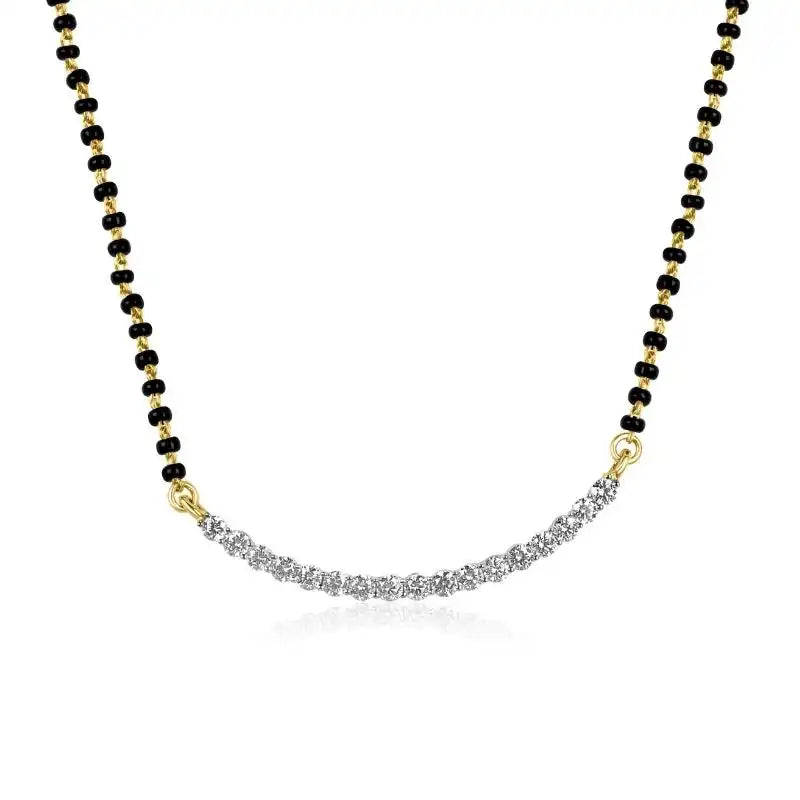 Elegant 18K gold mangalsutra with sparkling diamonds and black beads
