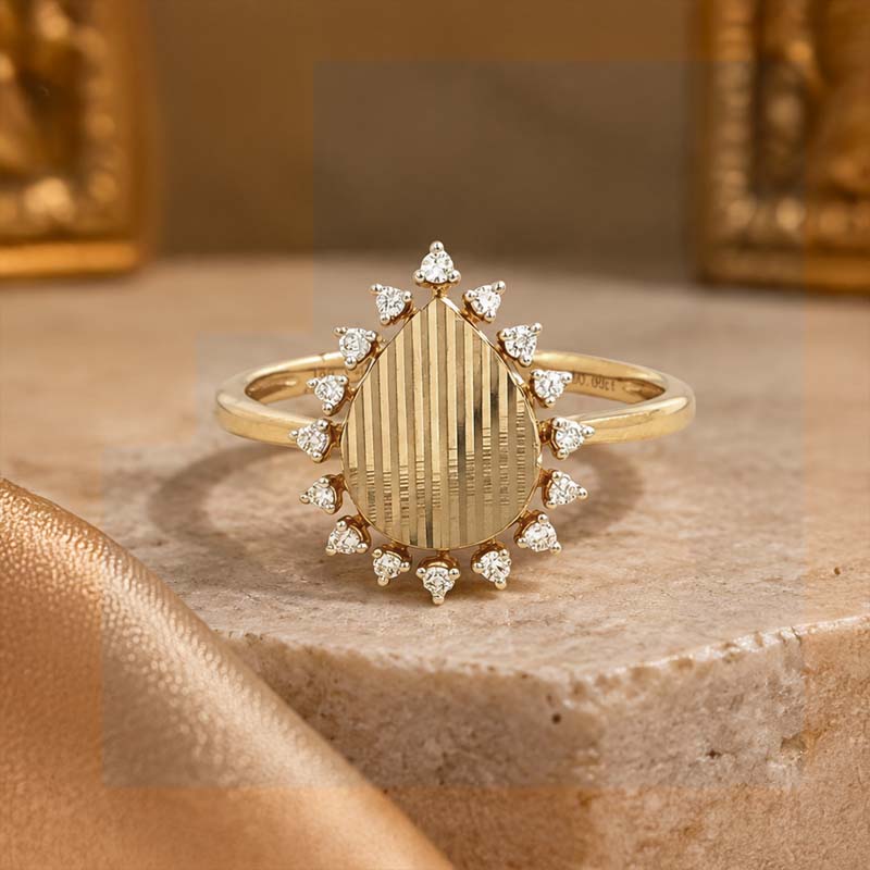 18K Yellow Gold Pear Shaped Diamond Ring for a Sophisticated Look