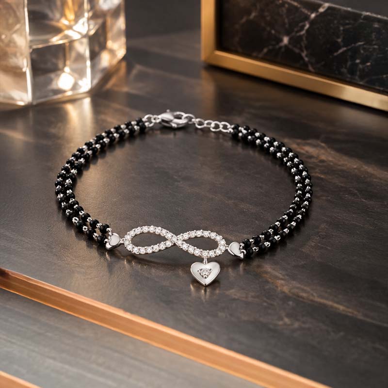 Infinity Bracelet in Black beads and 18K White Gold