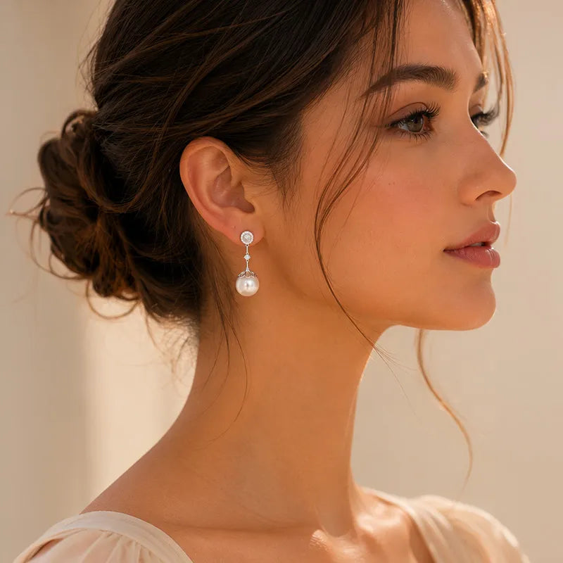 18K Pearl Earrings with Gold and Diamonds.