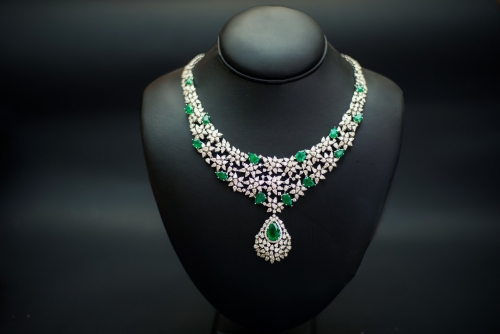Indulge in elegance with our Diamond Emerald Set. ...
