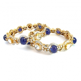 Pair of stunning bangles with uncut diamonds and gemstones