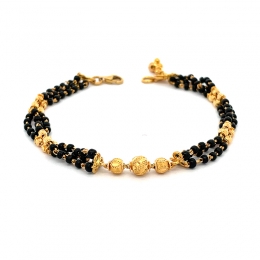 Elegant Black and Gold Bracelet, 7.5 inches