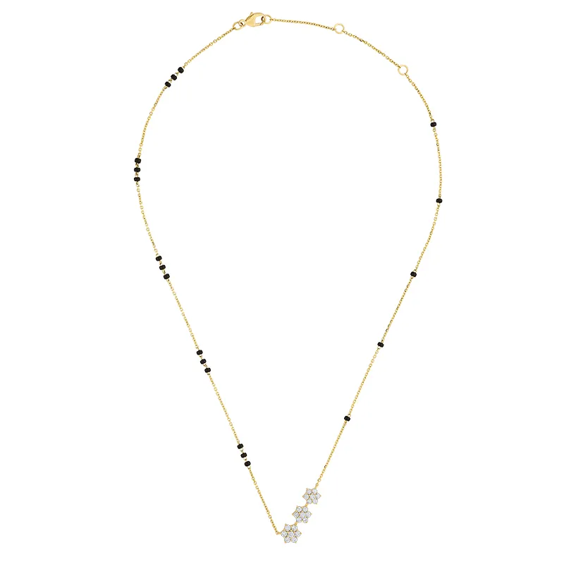 Floral Diamond Mangal Sutra in 18K yellow gold.