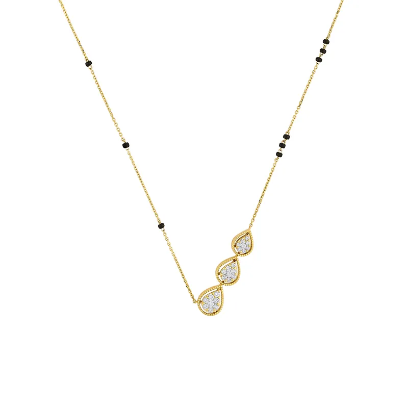 Elegant necklace in Gold Diamond and black beads.
