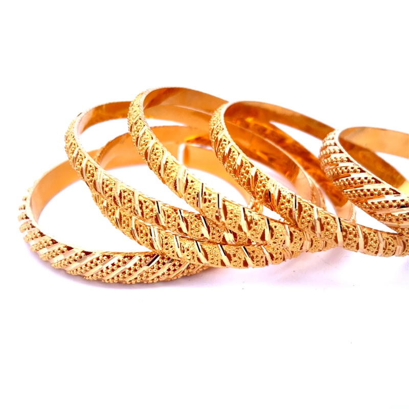 Elegant Gold bangle Set with intricate detailing - Size 2.5