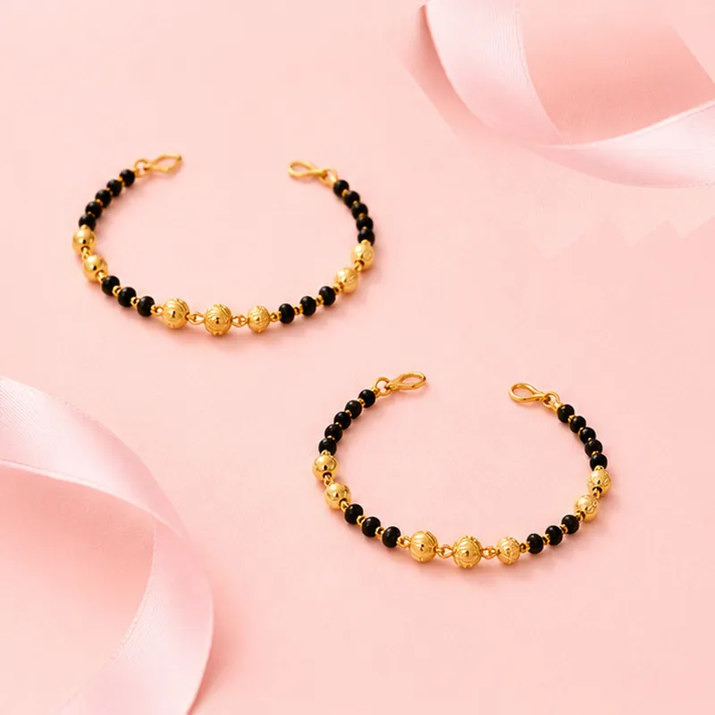 Elegant 22K Yellow Gold Baby Bracelet Set with Black Beads for Everyday Charm