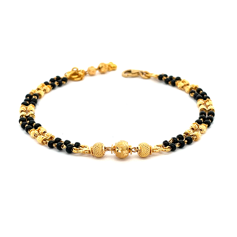 Elegant Gold and Black Bracelet - 7.25 inches