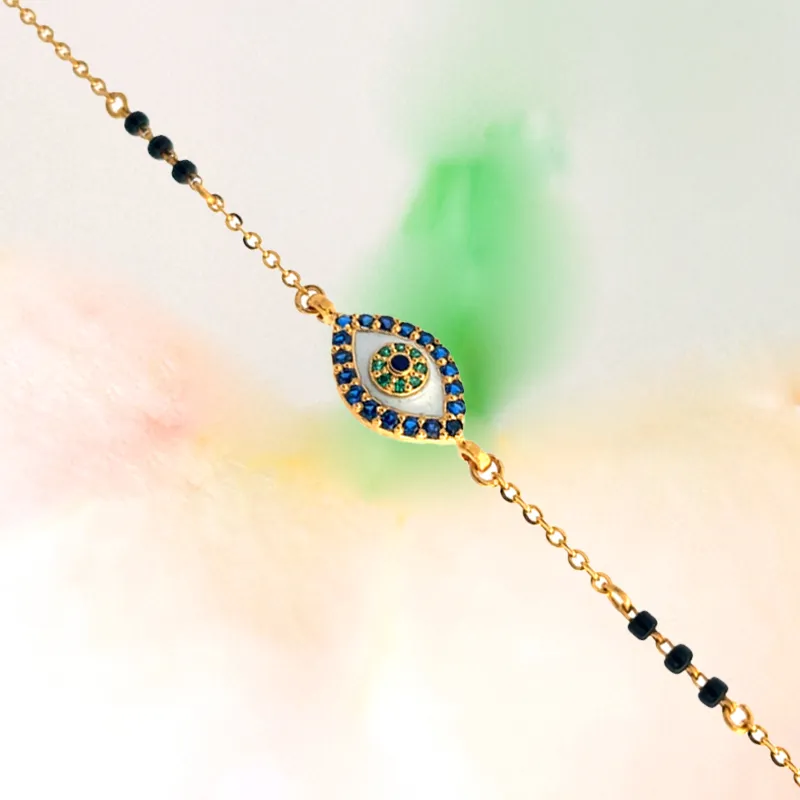 Elegant Yellow Gold Chain Bracelet with Eye Pendant