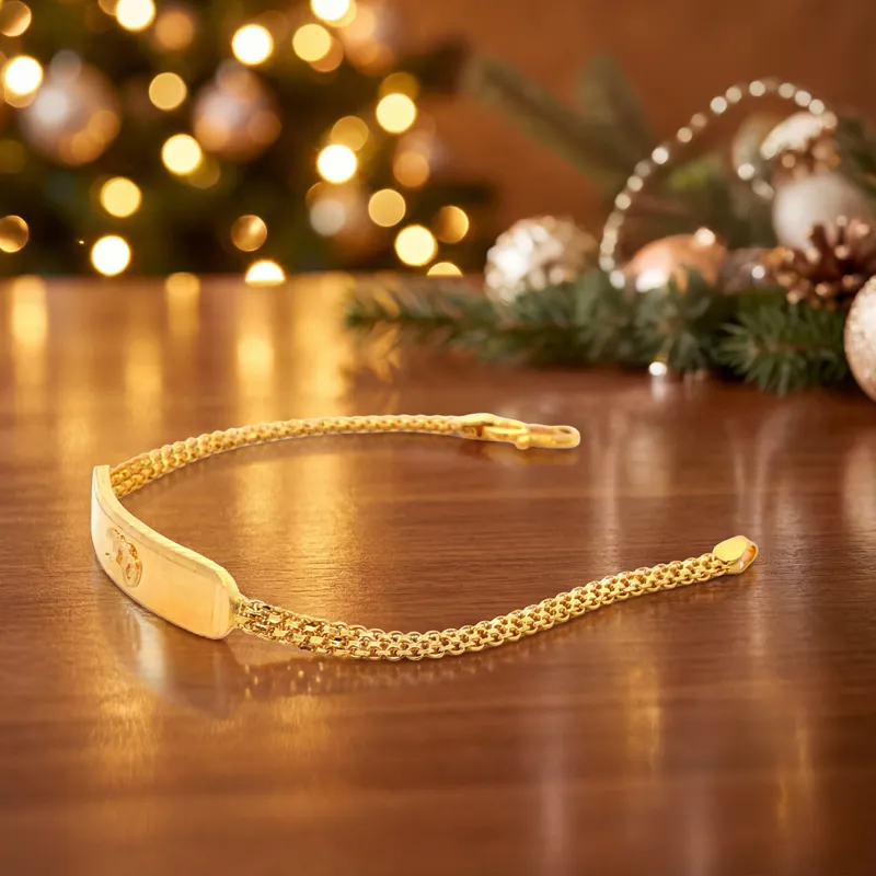 Elegant Yellow Gold Chain Bracelet with OM