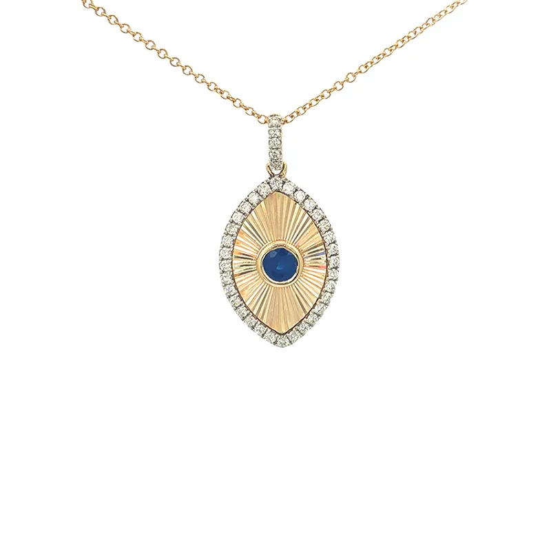 Oval sapphire pendant and matching earrings set in lustrous 18K yellow gold with diamond accents