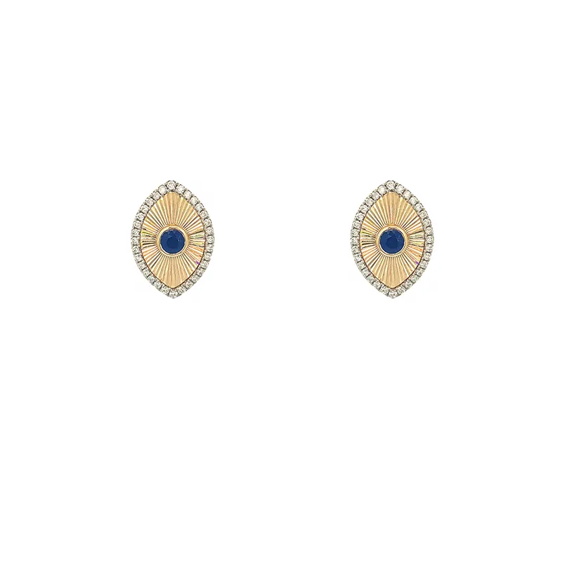 Oval sapphire pendant and matching earrings set in lustrous 18K yellow gold with diamond accents