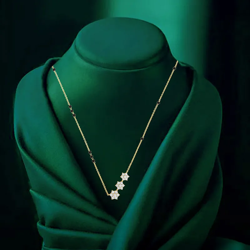 Floral Diamond Mangal Sutra in 18K yellow gold.